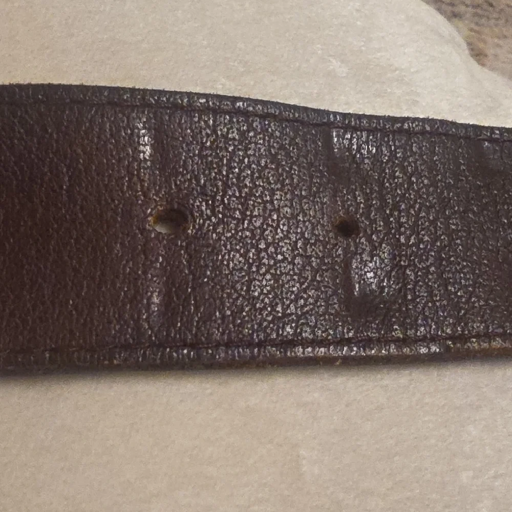 Linea Pelle Dark Brown Leather Belt with Brass-Tone Embossed Buckle